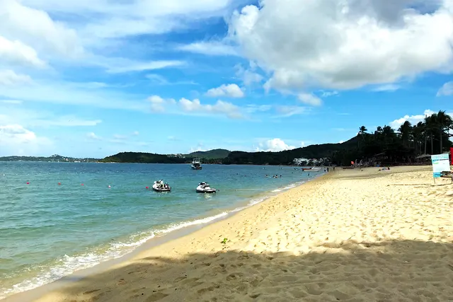 Bophut's Fisherman's Village shoreline on Koh Samui with boats in the bay
